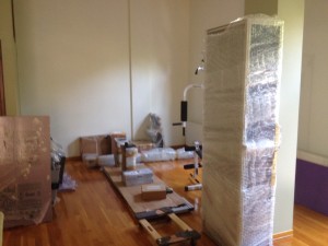 Preparing to unpack the IDD Therapy machine, freshly arrived by sea